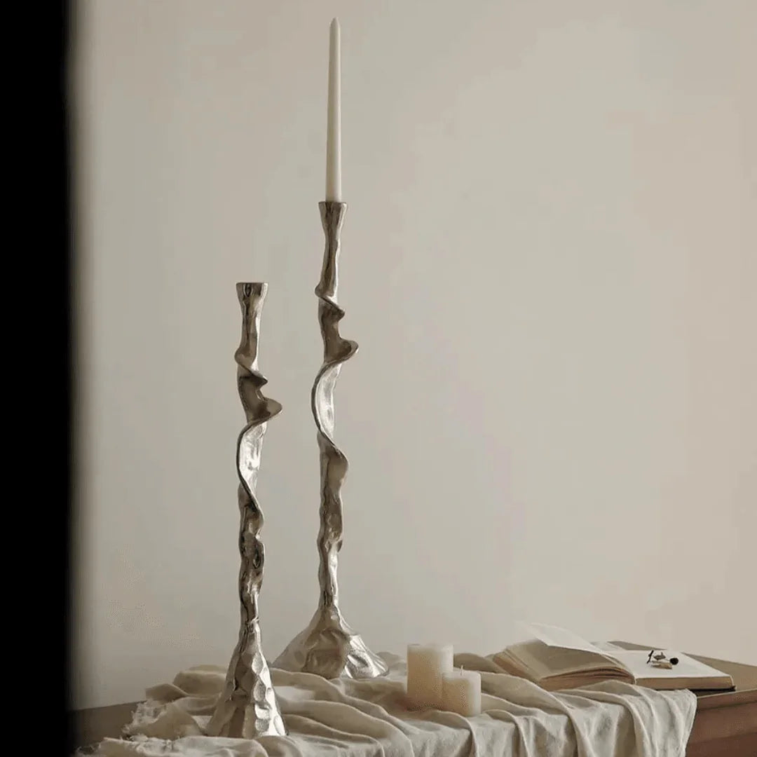 Sculptural Javessa candle holders on a dining table
