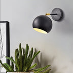 Adjustable Matte Metal Globe Wall Lamp with Brass Pivot Arm | Kelmera