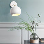 Adjustable Matte Metal Globe Wall Lamp with Brass Pivot Arm | Kelmera