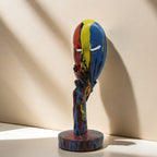 Artful Decoration in the Form of a Contemplative Figure | Kelmera
