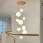 Cascading Glass Globe Pendant Lamp with Wooden Ceiling | Kelmera