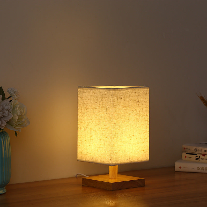 Compact Scandinavian Wooden Foot Table Lamp with Linen Lampshade | Kelmera
