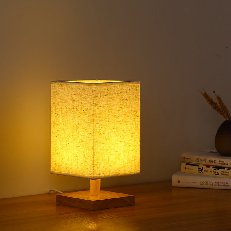 Compact Scandinavian Wooden Foot Table Lamp with Linen Lampshade | Kelmera