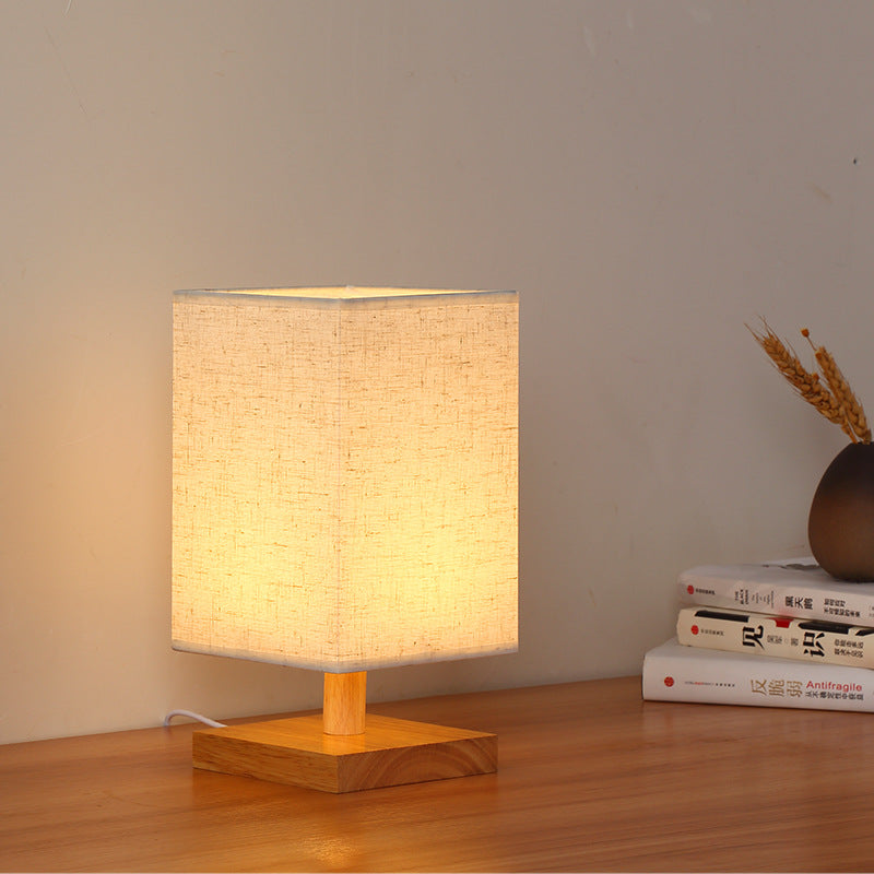Compact Scandinavian Wooden Foot Table Lamp with Linen Lampshade | Kelmera