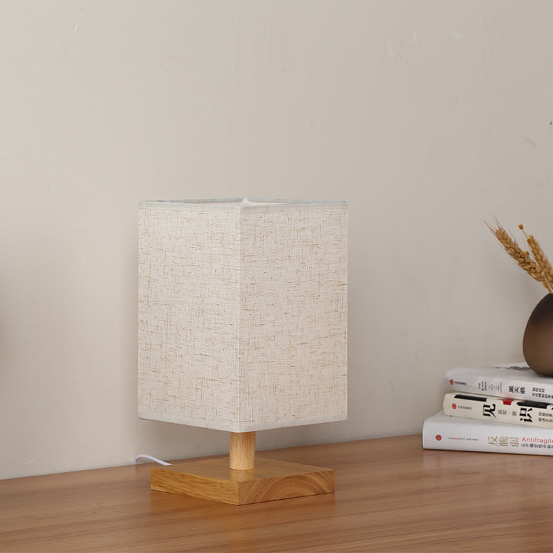 Compact Scandinavian Wooden Foot Table Lamp with Linen Lampshade | Kelmera
