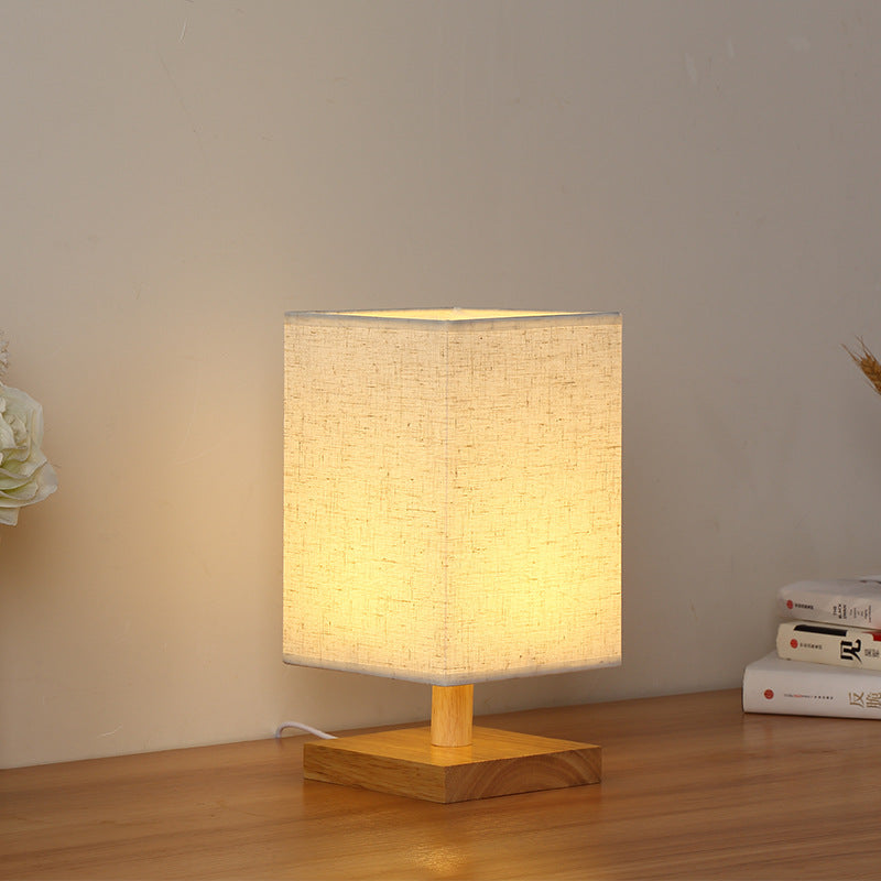 Compact Scandinavian Wooden Foot Table Lamp with Linen Lampshade | Kelmera
