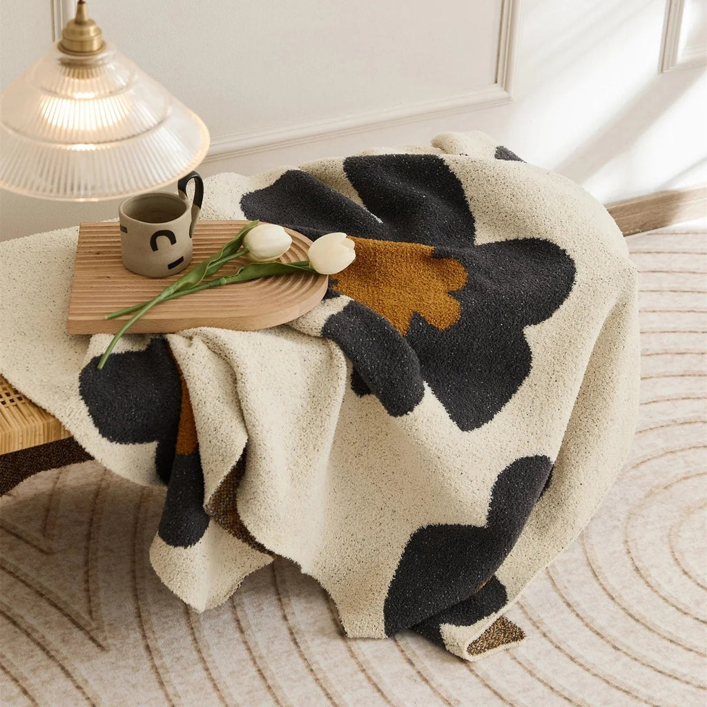 Harmita Throw Blanket