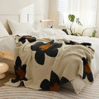 Harmita Throw Blanket