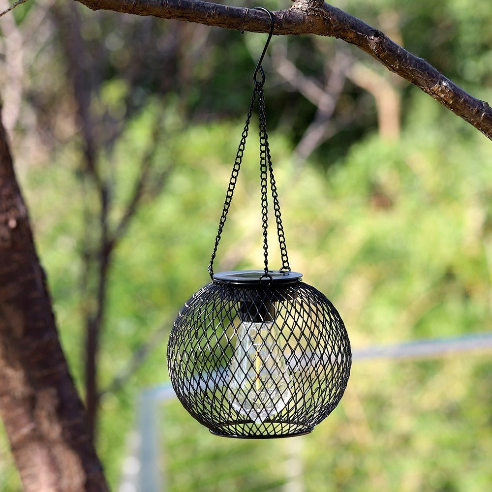 Outdoor Solar Hanging Lights in Metal Cage with Warm LED Candle Light | Kelmera