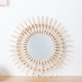 Playful Wall Mirror made of Rattan | Kelmera