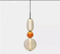 Stacked Orb Glass Pendant with Mixed Surface | Kelmera