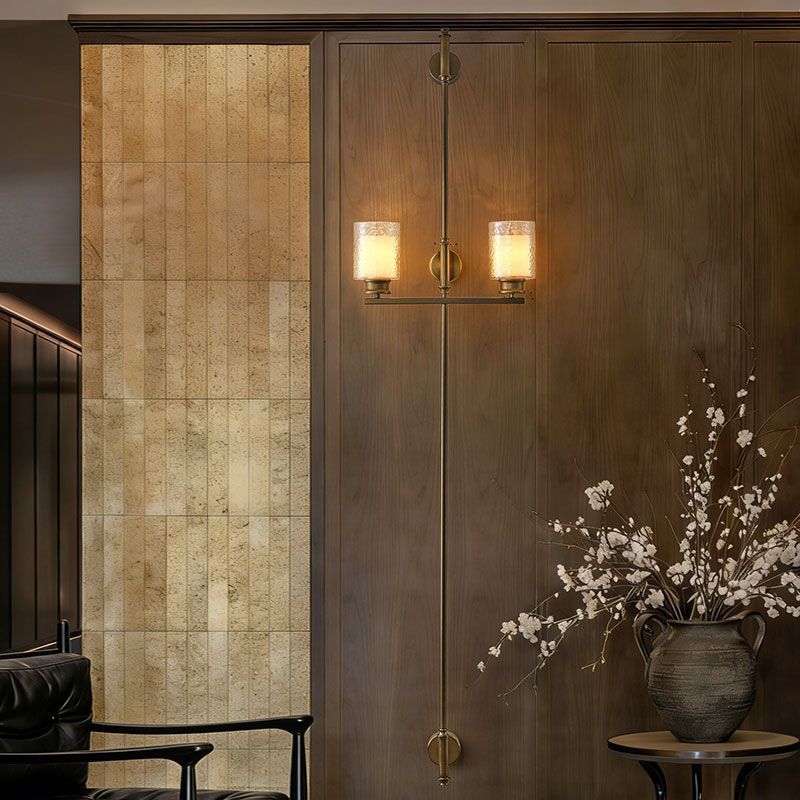 Vertical Brass Dual Glass Cylinder Wall Lamp with Strap Detail | Kelmera