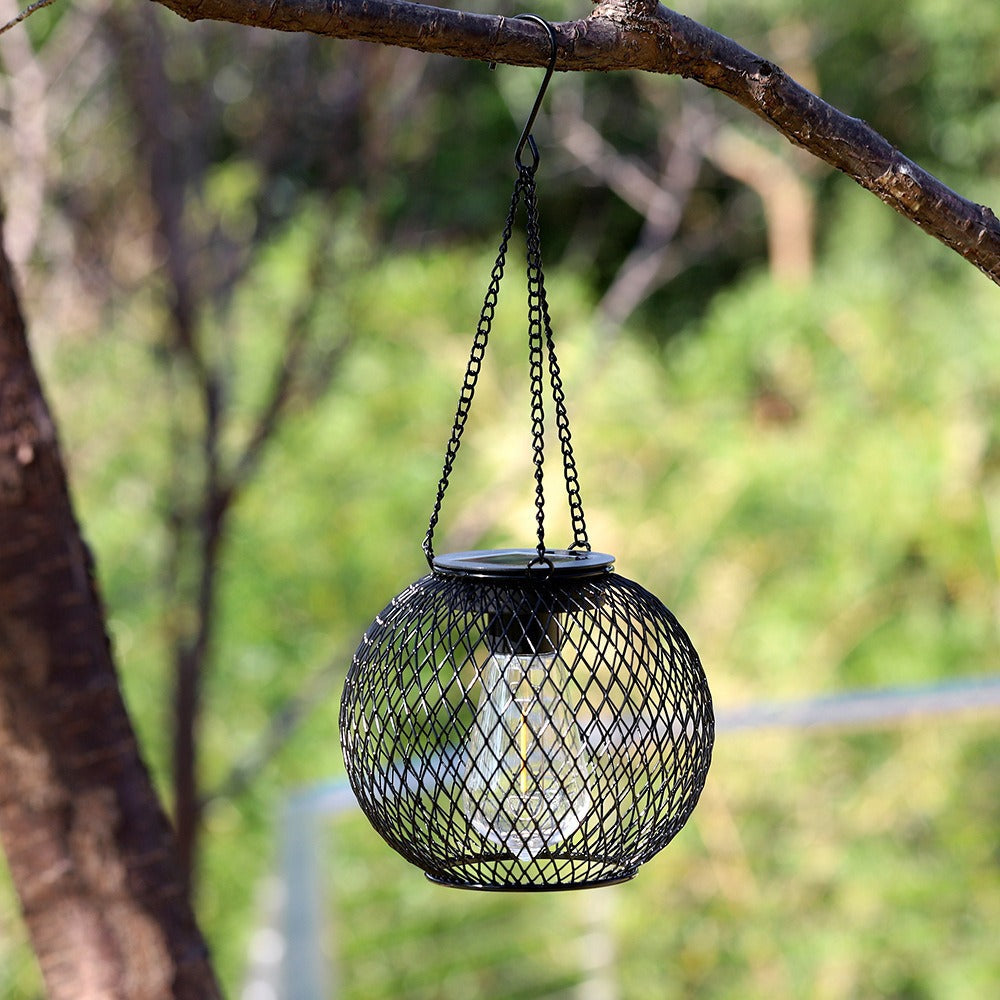 Weatherproof Hanging Solar LED Lanterns for Outdoor Use with Metal Cage, Warm Glass, and Hanging Chain | Kelmera
